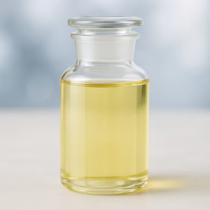 Yellow liquid chemical product in clear glass container