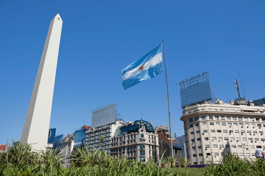 Buenos Aires Obelisk with Argentine flag in Plaza de la República, symbolizing Argentina’s culture and national identity