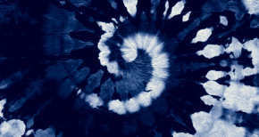 Blue and white spiral tie-dye pattern, symbolizing textile dyeing techniques, fabric design, and artistic fashion