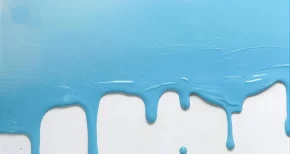 Paint droplets drying and forming a uniform layer.